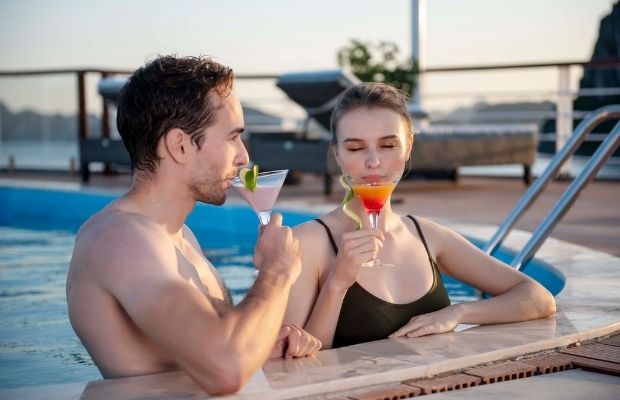 Enjoying cocktail on the pool